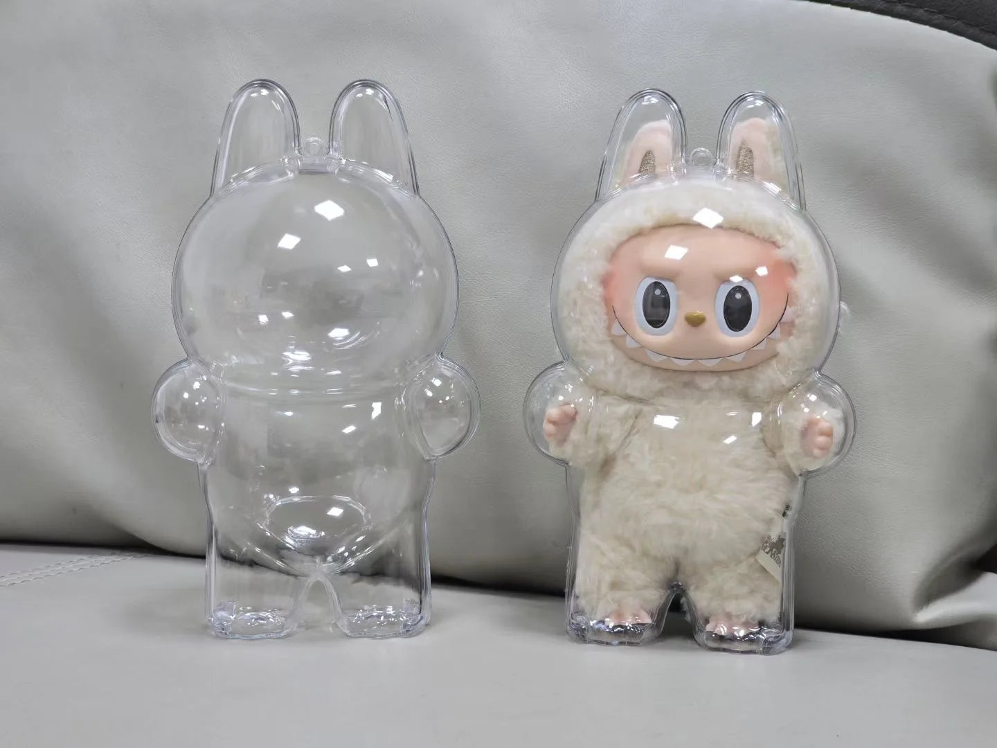 Labubu™ Protective Plush Sitting Bag – 17cm Transparent Dustproof Cover